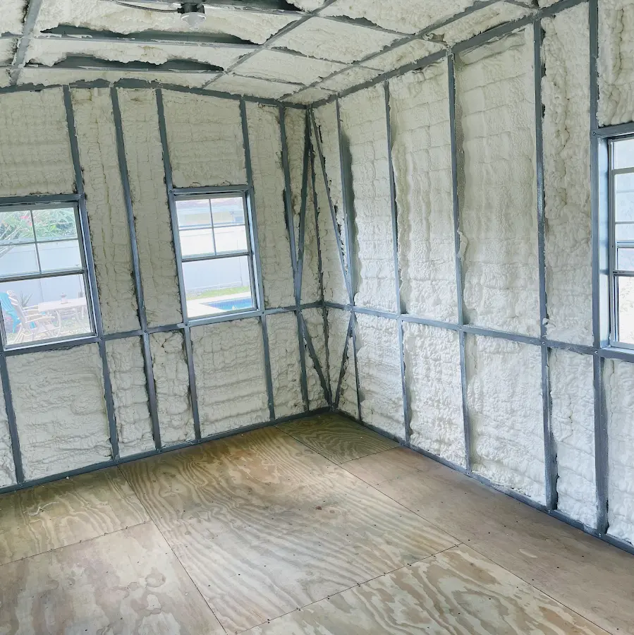 Closed-cell spray foam insulation applied to wall cavities in a residential project in Florin